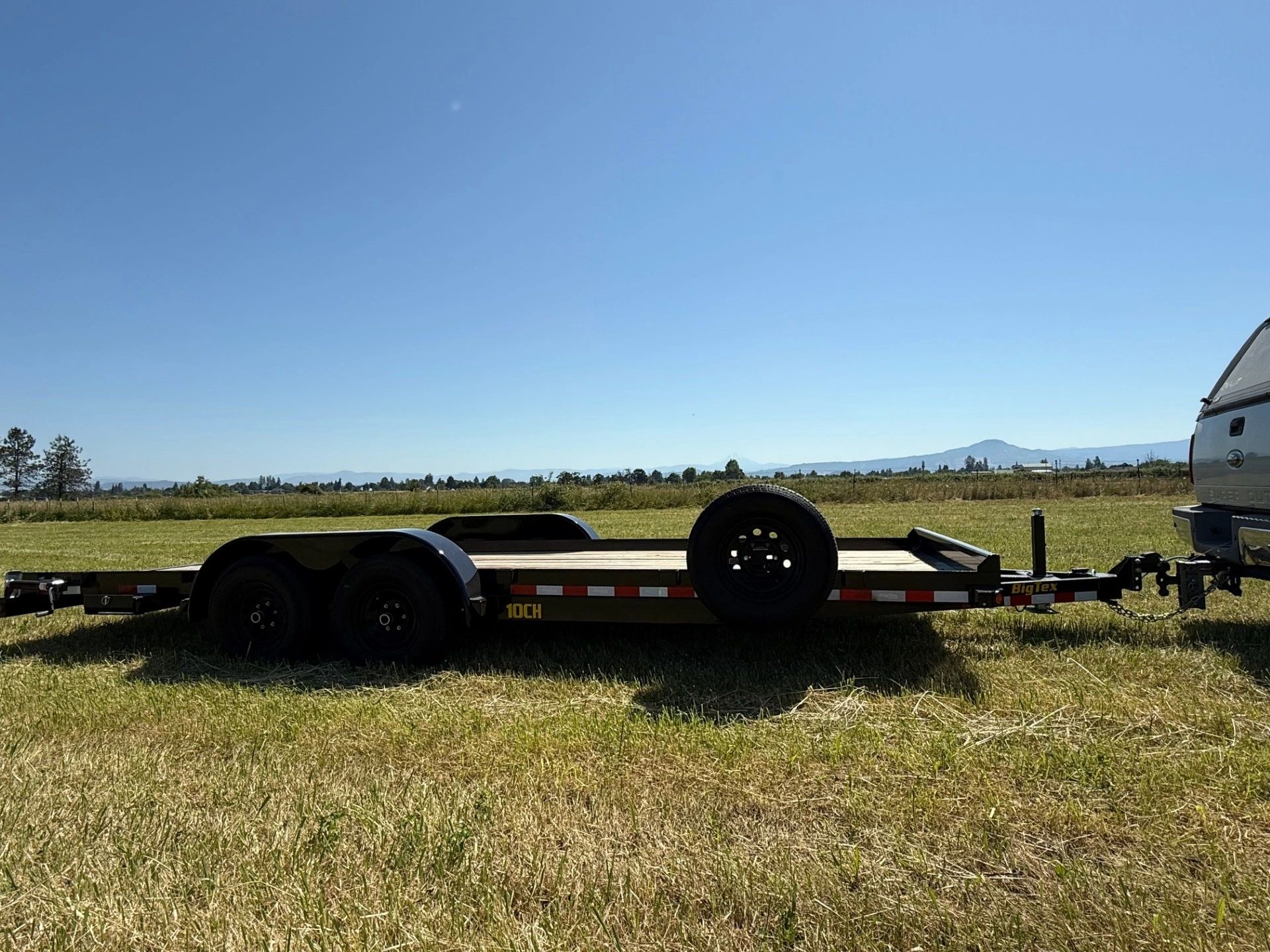 Big Tex car hauler in a Southern Oregon field